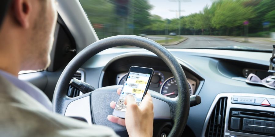 multas para uso do telemóvel ao volante