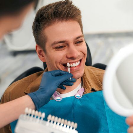 6 formas de poupar na conta do dentista